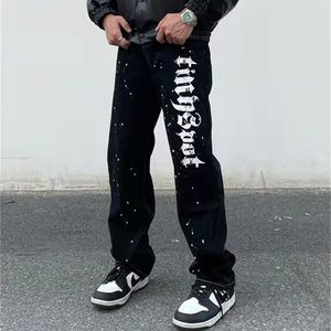 Mäns Jeans målade brev Tvättade Retro Straight Denim Byxor Mens och Kvinnor Hip Hop Loose Casual Byxor