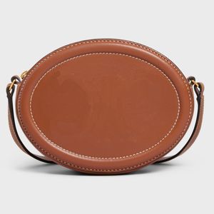 Womes Small Leather Products Clutches Crossbody Oval Purse i slät kohuddesigner axelväska kalvskinn foder guldmetall hardwar273t