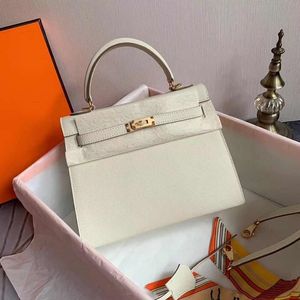 Wholesale grass handbags for sale - Group buy 2021 new hand bag messenger fashion Boston horizontal rectangle coffee white red gray leather alphabet buttons one shoulder crescent bucket grass flower