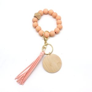 2022 new Cross-border personality bracelet craft carved wood beads keychain blank disc tassel key ring pendant multi-color o