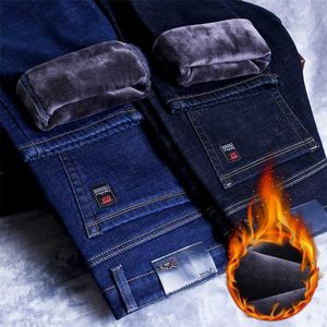 Homens de inverno quente magro ajuste calça jeans moda de negócios engrossar jeans calças lã trecho trecho calças preta azul 211008