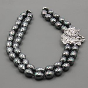 Chokers GuaiGuai Schmuck 2 Reihen Schwarze Muschel Perlenkette CZ Pave Blumenverbinder Handgefertigt für Frauen