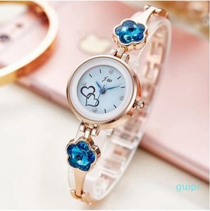 Orologio da polso con cinturino in lega semplice con strass a forma di fiore con cuore d'amore per orologi da polso da donna alla moda, da donna, da studentessa