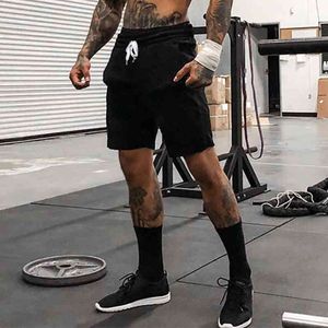 Letnie męskie szorty treningowe siłownia odzież bodybuilding krótkie spodnie mężczyzna siatki szybkie suszenie fitness jogger shorts shorts sportbroek 210421