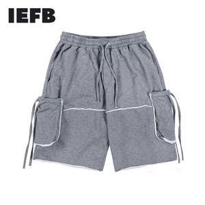 IEFB Solid Color Multi Pocket Cut Burrs Stitching Casual Sports Shorts Mäns Enkla Streetwear Fashion Loose Black Grey Shorts 210524