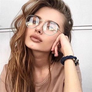 Montature per occhiali da sole alla moda 2021 occhiali rotondi vintage da donna lenti trasparenti montatura in metallo dorato occhiali da vista ovale falso