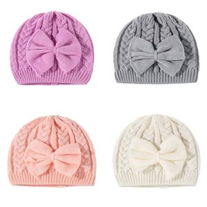 Ins 4 Colors Elegant Big Bow Knot Baby Girl Caps Winter Protect Ear Warm Beanies Candy Color Knit Infant Hats 0-3T