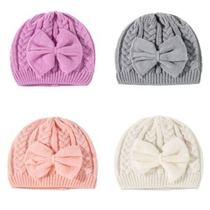 Ins 4 Cores Elegante Big Bow Nó Baby Girl Caps Winter Proteger Orelha Quente Doces Cor Doces Cor Knit Infantil Bonés 0-3T