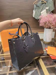 2021Designer women's single shoulder portable shopping bag embossing craft big flower two sizes