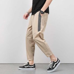 Korean Summer Men'S Thin Splicing 9-Point Pants Ice Silk Ventilation Trend Straight Tube Loose Elastic Legged Casual Trousers X0723