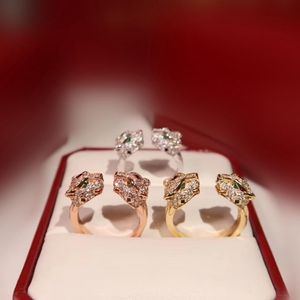 Cluster ringen verharde zirkoon steen twee luipaard hoofd vinger ring groen oog panther dierlijke mannen vrouwen verklaring cool party open sieraden