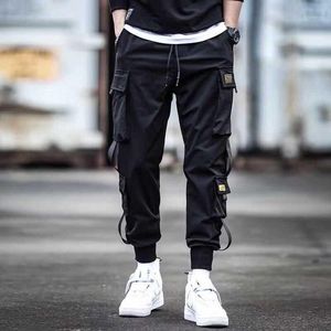 Мужские брюки сухие карманные полнометражные мужчины HIPHOP Joggers плюс размер брюки пояса женщины уличные