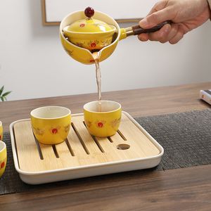 Gelbes chinesisches Drachen-Designer-Reise-Tee-Set, einzigartiges Gemälde, hochwertiges drehbares Teegeschirr, KungFu-Teeset, cremiges Geschenk für Freund