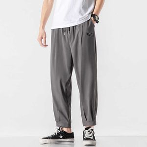 2021 Harajuku Uomini di Estate Pantaloni Casual Mens di Affari Pantaloni Maschile Allentato Elastico In Vita Stile Coreano Pantaloni Della Matita Dei Pantaloni Degli Uomini X0723