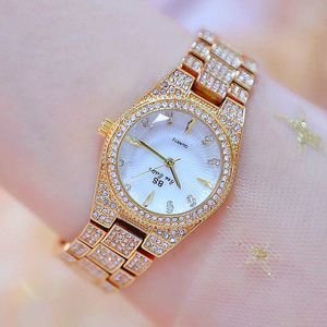 女性の高級ブランドウォッチドレスレディースは女性のためのダイヤモンドクォーツゴールドの腕時計のための女性クリスタルクロックモノトルトフェムミ210527