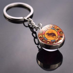 Nyckelringar Kina Traditionell kultur 12 Kinesisk Zodiac Keychain Animal Rat Ox Tiger Glass Ball Nyckelring för 2021 års gåva