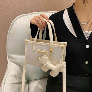 This year's small bag women's new canvas sling Shoulder Messenger Bag portable square Purse