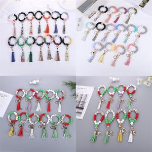 47 Färg Beaded Keychain Party Favorit Trä Tassel String Chain Food Grade Silikon Bead KeyRing Kvinnor Armband Strap Armband By Sea T9i001547