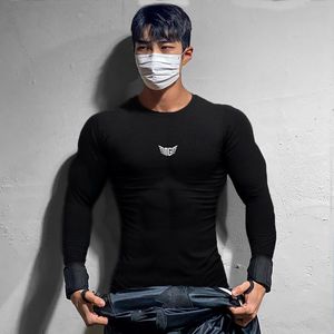 MuscleGuys Koşu T-Shirt Sıkıştırma Sıkı Uzun Kollu Spor Erkek Spor Gömlek Koşu Hızlı Kuru Eğitim Tees Spor Giyim 210421