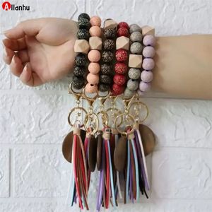 30PC / DHL Personlig Läder Tassel Armband Key Ring Kedjor Trä Beaded Wristlet Bangle Snidade Pärla Elastiska Handled Bands Charm Pendants Smycken Wbfg