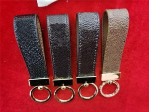 2023 new Brown flowers Keychain Key Chain Buckle Keychains Lovers Car Handmade Leather Men Women Bags Pendant Accessories 4 Color have with box dust bag black