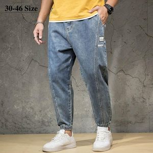42 erkek kot pantolon artı pamuklu hip-hop sokak kıyafeti harem denim pantolon bahar yaz markası gevşek moda rahat pantolon