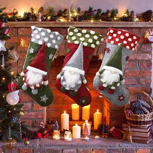 フィジットのおもちゃクリスマスの家の装飾ペンダントの靴下ぬいぐるみかわいいサンタクロースぬいぐるみ柔らかいピンクのお祝い雰囲気子供のギフトを開く驚きの卸売卸売