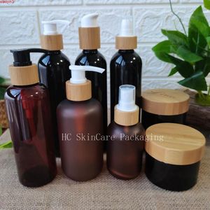 Partihandel tom anpassad logotyp kosmetiska flaskor burk med bambu trä pump lock plast hudvård förpackning behållare schampo flaskor