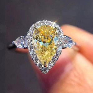 チョーコンブランドの結婚指輪シンプルなファッションジュエリー925銀の充填梨カットイエロー3A立方ジルコンCZダイヤモンド永遠の女性の婚約バンドリングのための恋人ギフト