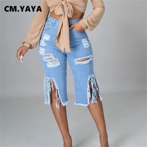 Cm.Yaya kvinnor jeans hål rippad tassle låg midja elastisk flare knä längd denim byxor sexig mode high street byxor 210708