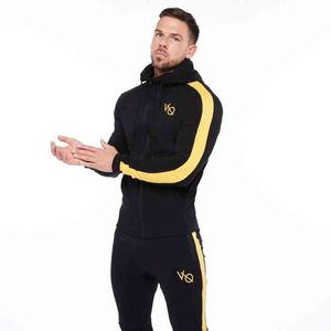 Nowe Mężczyźni Bieganie Zestawy Sportowe Garnitury Bluzy Spodnie Zestawy Bawełniane spodnie Dresswear Odzież Gym Fitness Trening Dresy Y1221