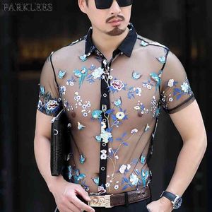 フローラル刺繍を見る魚網のシャツの男性セクシーなスリムフィット透明なドレスシャツメンズパーティーイベントレースの化学210522