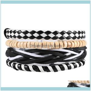 Bracciali con perline Gioielli Fili di perline Set da 4 pezzi / Bracciale da uomo in pelle intrecciata a carica intrecciata in bianco e nero Fascino vintage Perline di legno Etnico