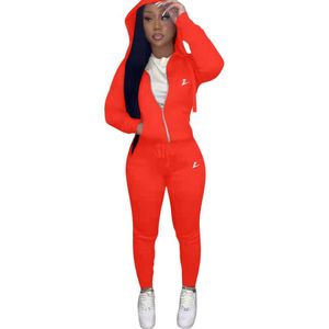 النساء الصلبة المخملية 2 قطعة من السوستة الأمامية Desinger Tracksuits جيب جيب طويل الأكمام