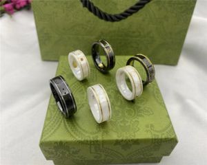 Italienisches Design, 18 Karat Goldrand, Paarring, modischer einfacher Buchstabenring, hochwertiges Keramikmaterial, Ring, Modeschmuck, Lieferung von Urlaubsgeschenken