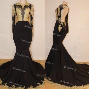 Abiti eleganti da ballo in pizzo nero e oro per le donne africane Abito da sera sexy a sirena con schiena aperta con maniche lunghe Vedere attraverso l'abito da festa formale vestidos de fiesta