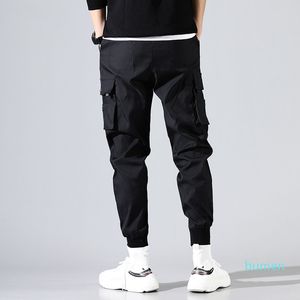 Hip Hop Men Pantalones Hombre High Street Kpop Casual Cargo Pants with Many Pockets Joggers Modis Streetwear Trousers 2021