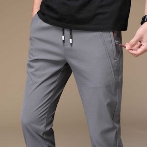 Letnie mężczyźni spodnie dresowe Ciepłe cienkie spodnie Luźne elastyczne spodnie talii casual spodnie spodnie duże plus rozmiar 38 210707