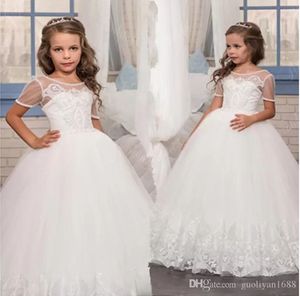 Ny Elegant Första Kommunen Klänningar För Tjejer Applique Princess Tulle Lace Hem Kids Graduation Pageant Communion Ball Gown