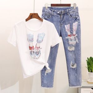 Kadın Yaz Örgü Aplikler Payetli Pamuk Tişörtleri + Buzağı Uzunlukta Delik Denim Pantolon Suit Ayakkabı Desen Sequins Jeans Giyim Seti 210416