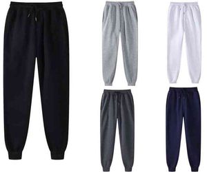 Varum￤rke Pants M￤n och kvinnor Vinter Casual Fashion Jogging Autumn Black White Sports Solid Color Daily Sweatpants 0124