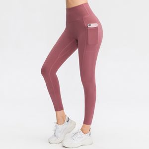 Capris Lululemens Women Women Comens Yoga Pants European Surise Sports Fiess Active Gym Leggings Wysoka talia Rajstopy z kieszeniami785