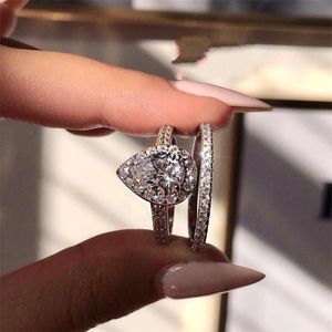 古典的な結婚指輪の高級ジュエリーレアル925スターリングシルバーウォータードロップ5aジルコンCZダイヤモンド宝石パーティー永遠の女性カップルブライダルリングセットギフト
