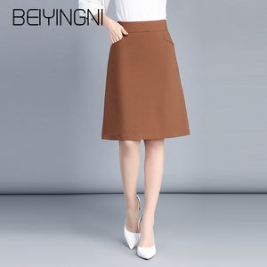 Beiyingni Plusサイズオフィスレディスカートブラックポケット弾性ハイウエストスカートOL韓国の作品はMidiスカートファッション服を着用210416
