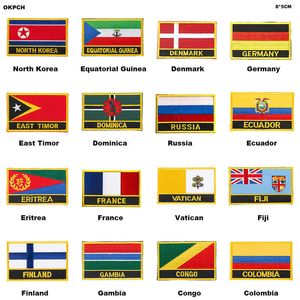 Distintivo ricamato con bandiera nazionale Corea del Nord Guinea Equatoriale Danimarca Germania Timor Est Dominica Russia Vaticano