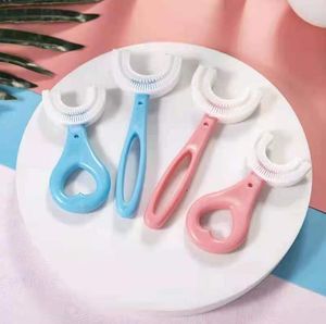 Bébé enfants jouets de dentition soins de santé brosses en forme de U 360 degrés silicone souple main nettoyage buccal dent pour garçon fille âge 2-12T