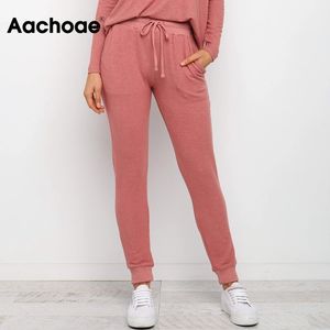 Aachoae النساء عارضة السراويل قلم رصاص الرباط عالية الخصر sweatpants طويلة مع جيوب الرياضة ارتداء عداء ببطء السراويل pantalones 210413