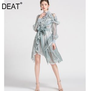 Frauen Asymmetrische Schleife Organza Metallknopf Runway Kleid Stehkragen Lange Puffärmel Mode Frühling Herbst 2F0289 210421