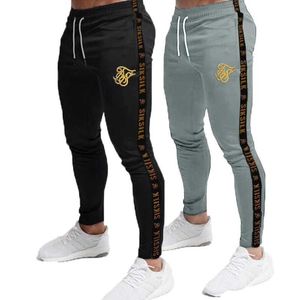 Pantaloni da jogging da uomo Pantaloni sportivi Sik Silk Fitness Pantaloni elastici Hip Hop Tuta skinny Pantaloni Siksilk Pantaloni da uomo casual in seta Y0811