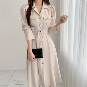 Elegancka jednopierierska lapel kobiety MIDI Dress Moda Długi rękaw Opasowany Slim Talia Kobiet Workwear Vestidos 210519